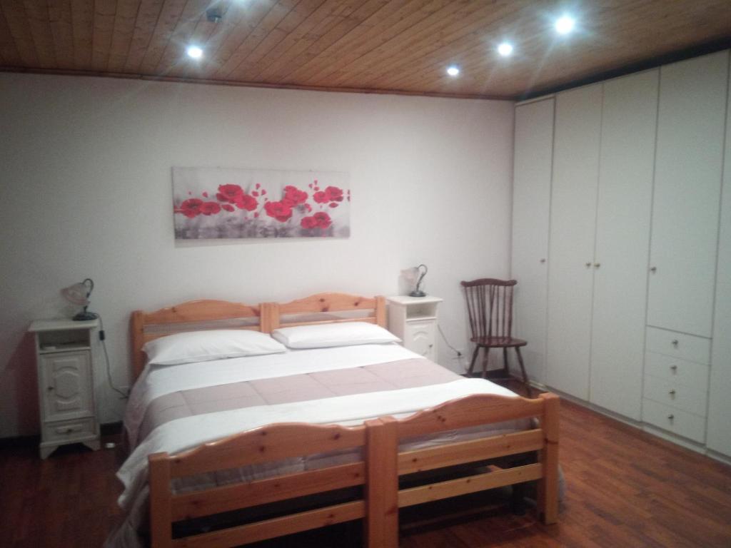 Postel nebo postele na pokoji v ubytování B&b SAN LORENZO