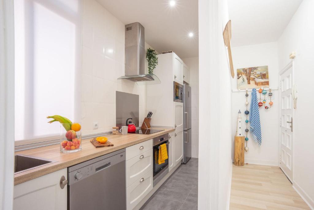Kuchyňa alebo kuchynka v ubytovaní Sustraia - Local Rentss