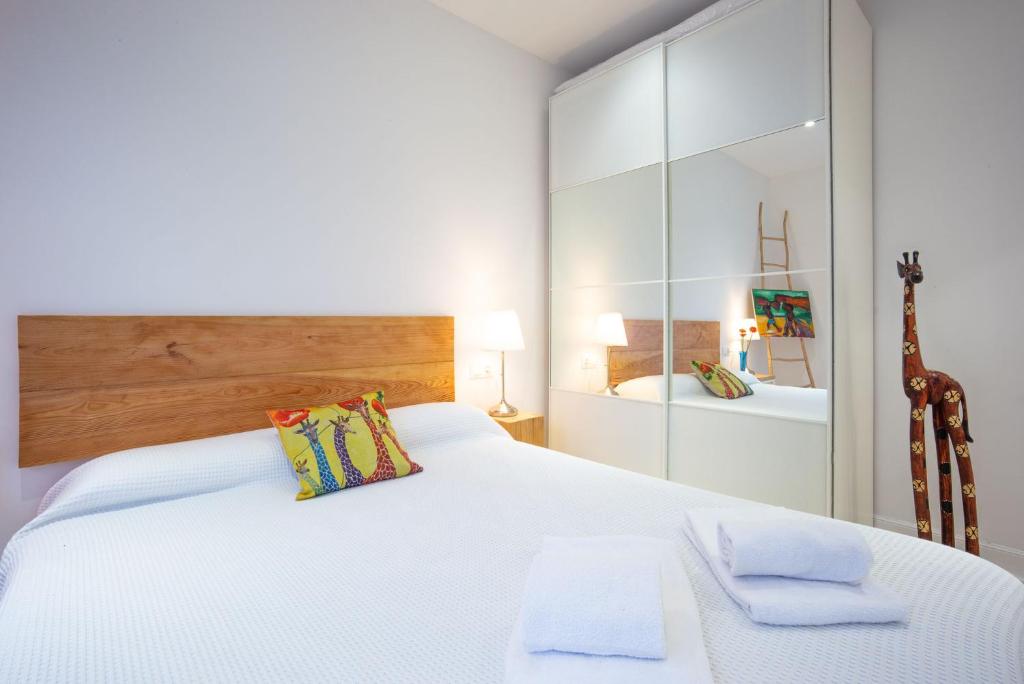 Posteľ alebo postele v izbe v ubytovaní Sustraia - Local Rentss