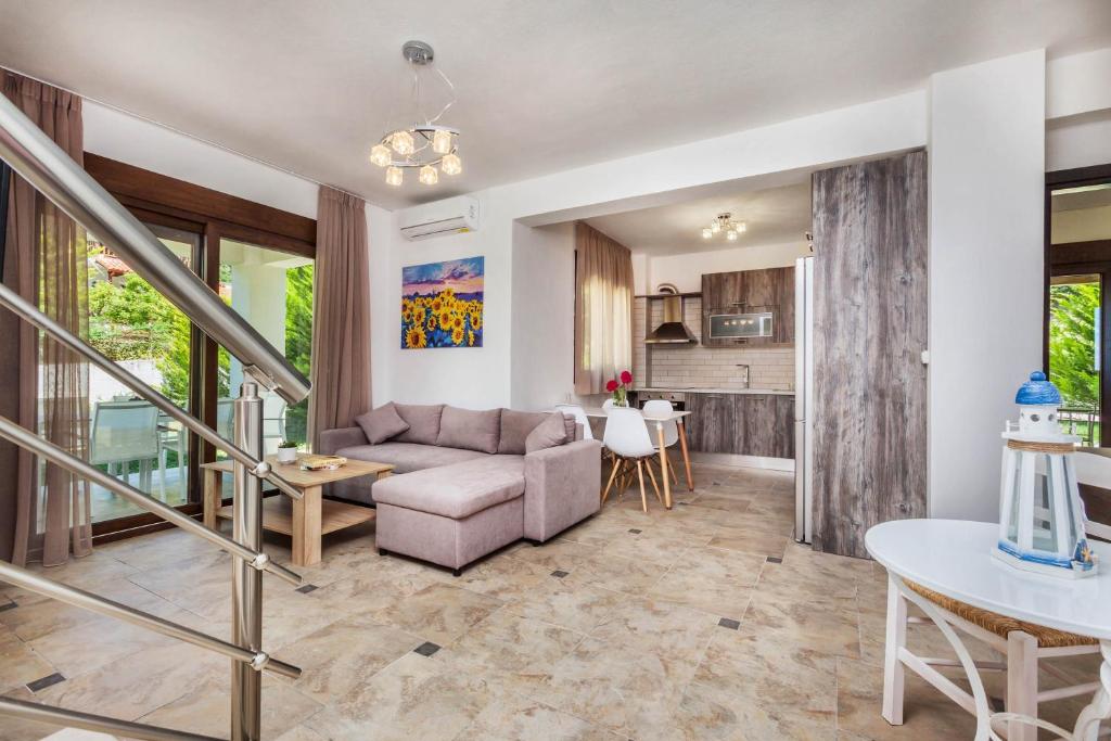 Kuchyň nebo kuchyňský kout v ubytování Sunset Villas