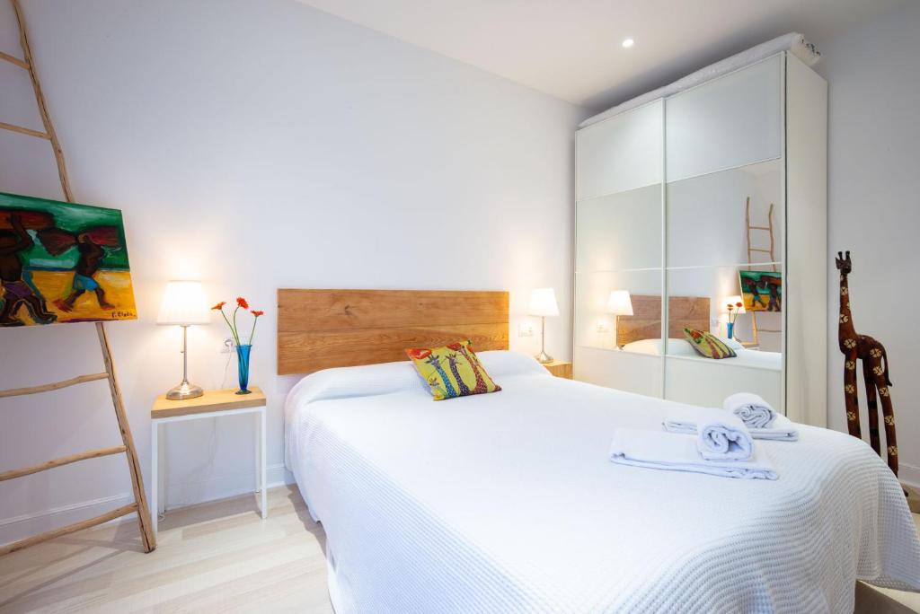 Posteľ alebo postele v izbe v ubytovaní Sustraia - Local Rentss