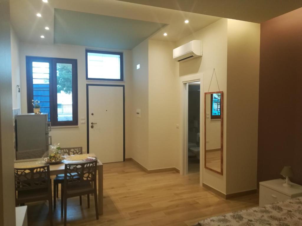 TV a/nebo společenská místnost v ubytování Casa Melograno