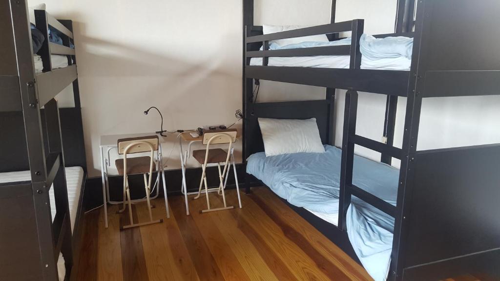 Postel nebo postele na pokoji v ubytování Asobi Lodge