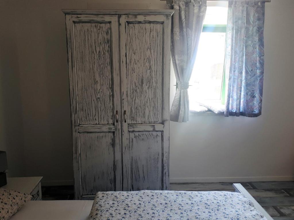 Postel nebo postele na pokoji v ubytování Apartment Terra Rossa
