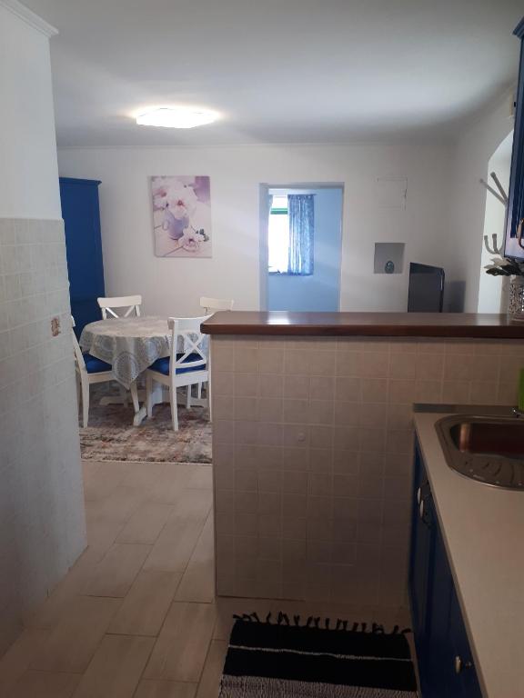 Kuchyň nebo kuchyňský kout v ubytování Apartment Terra Rossa