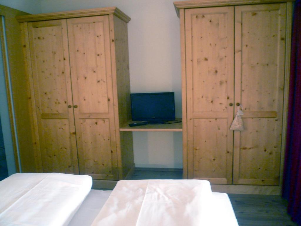 Postel nebo postele na pokoji v ubytování Appartement & Hotel Innerhofer