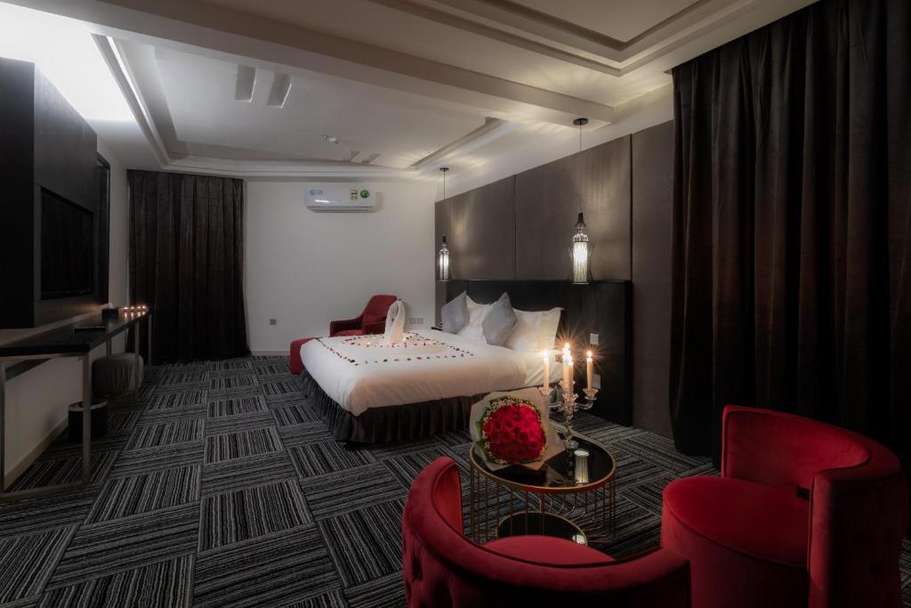 Postel nebo postele na pokoji v ubytování South Hotel Suites