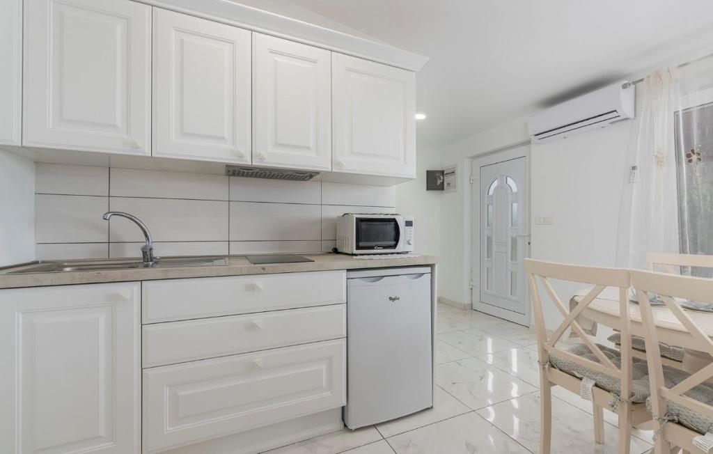 Kuchyň nebo kuchyňský kout v ubytování Apartment Complex Blazevic
