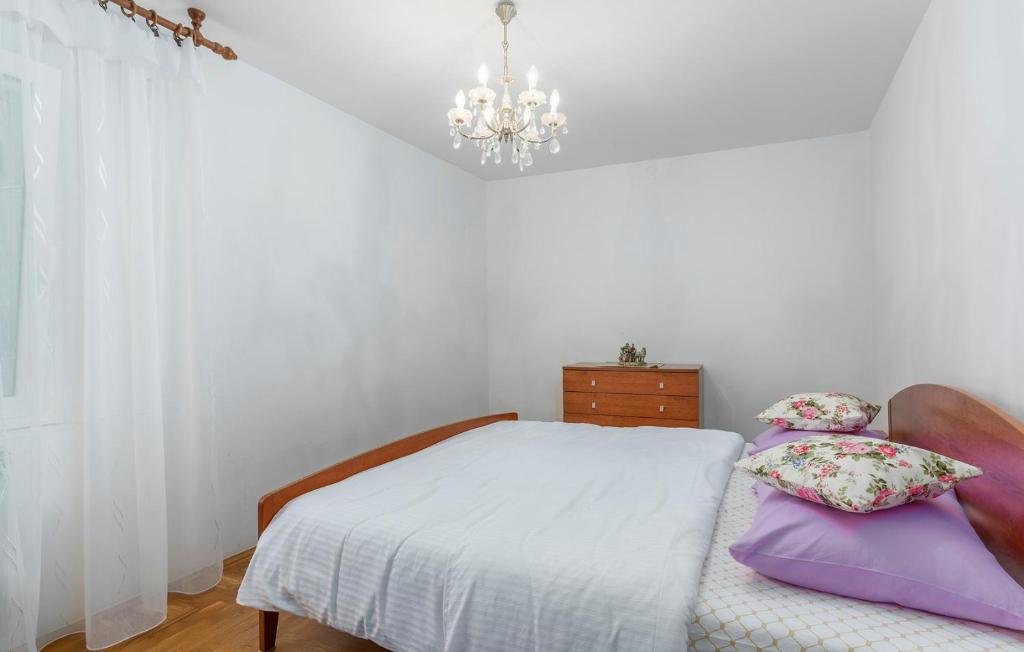 Postel nebo postele na pokoji v ubytování Apartment Complex Blazevic