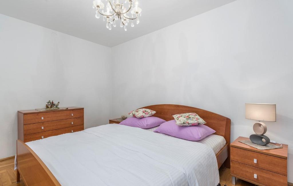 Postel nebo postele na pokoji v ubytování Apartment Complex Blazevic