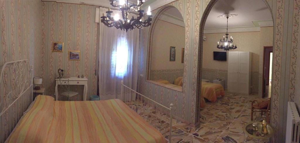 A bed or beds in a room at IL B&B Maison Graziella