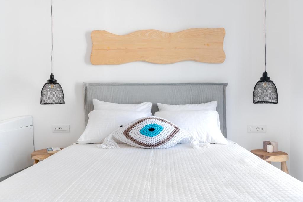 Posteľ alebo postele v izbe v ubytovaní Central Suites Mykonos