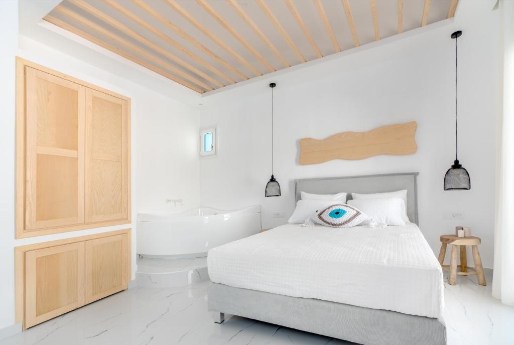 Posteľ alebo postele v izbe v ubytovaní Central Suites Mykonos
