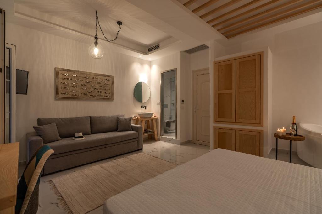 Posteľ alebo postele v izbe v ubytovaní Central Suites Mykonos