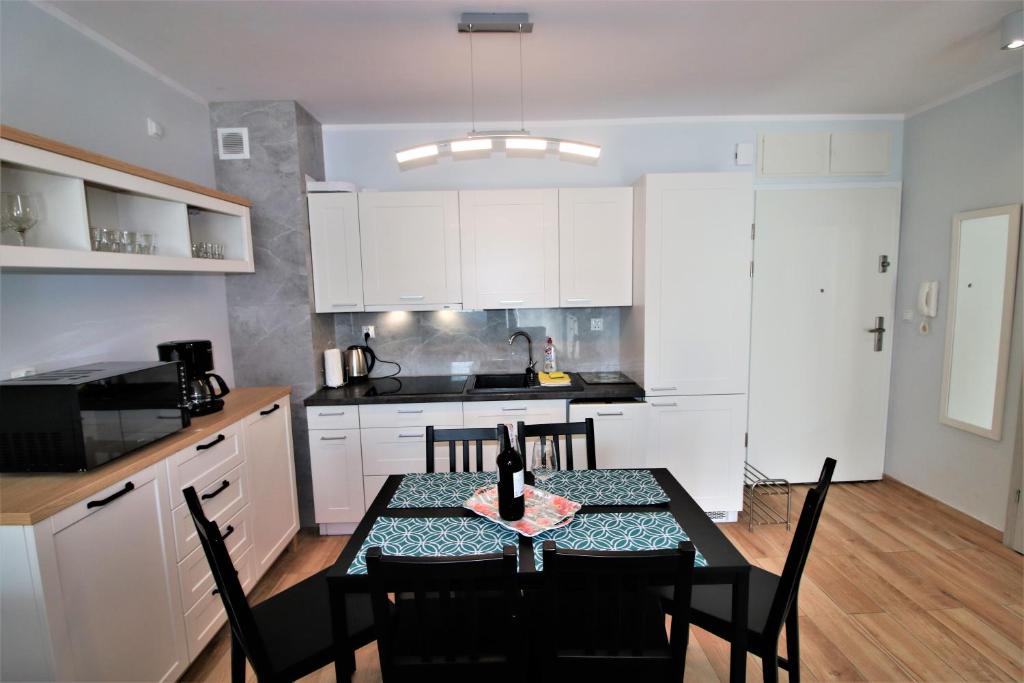 Kuchyňa alebo kuchynka v ubytovaní Bliżej Morza Luxury Apartments
