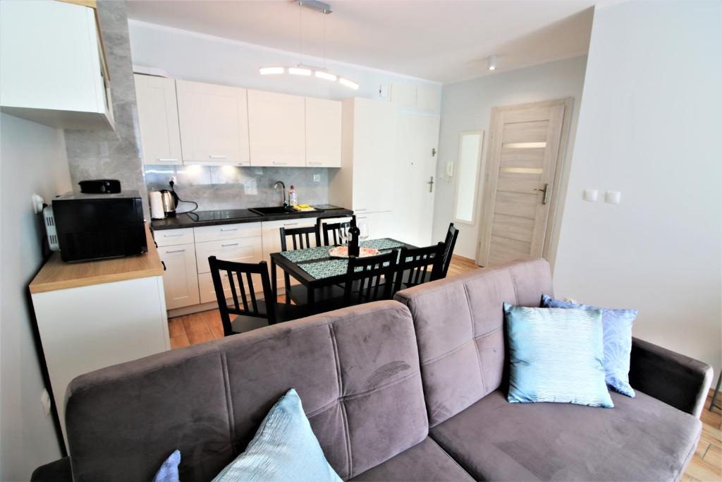 Kuchyňa alebo kuchynka v ubytovaní Bliżej Morza Luxury Apartments