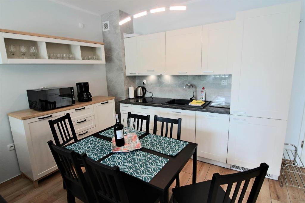 Kuchyňa alebo kuchynka v ubytovaní Bliżej Morza Luxury Apartments