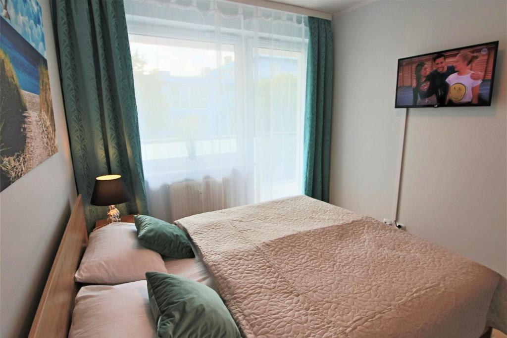 Posteľ alebo postele v izbe v ubytovaní Bliżej Morza Luxury Apartments