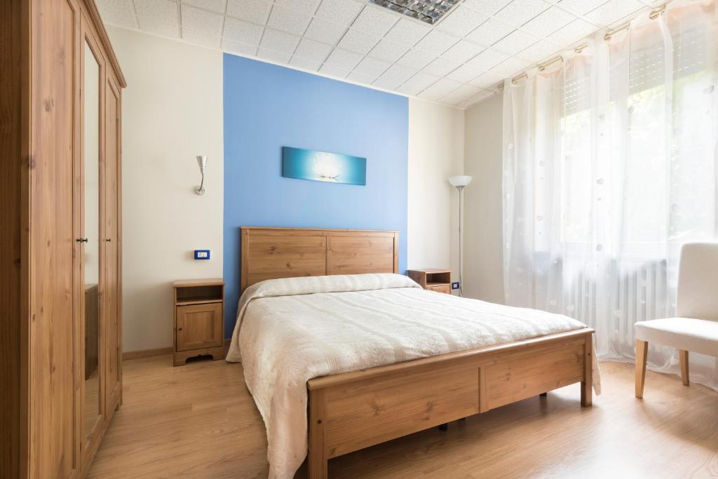 Postel nebo postele na pokoji v ubytování Le Betulle, Villa Ferrari