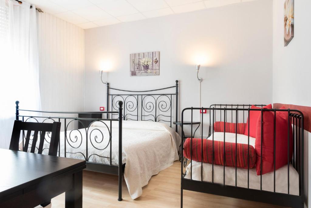 Postel nebo postele na pokoji v ubytování Le Betulle, Villa Ferrari