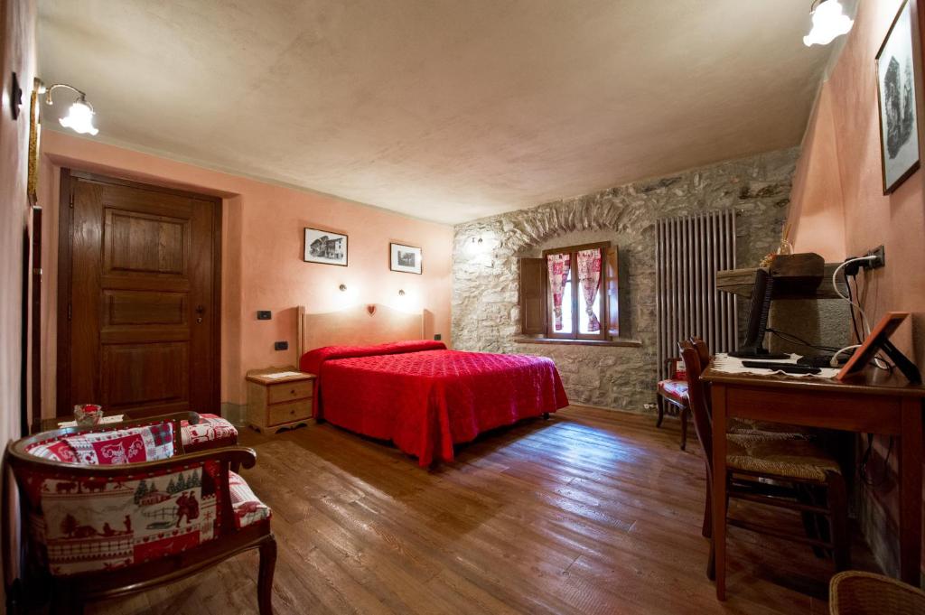 Postel nebo postele na pokoji v ubytování La Maison Des Vignerons Chambres D'Hotes B&B