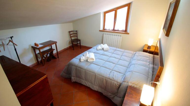 Posteľ alebo postele v izbe v ubytovaní Casale la Torretta