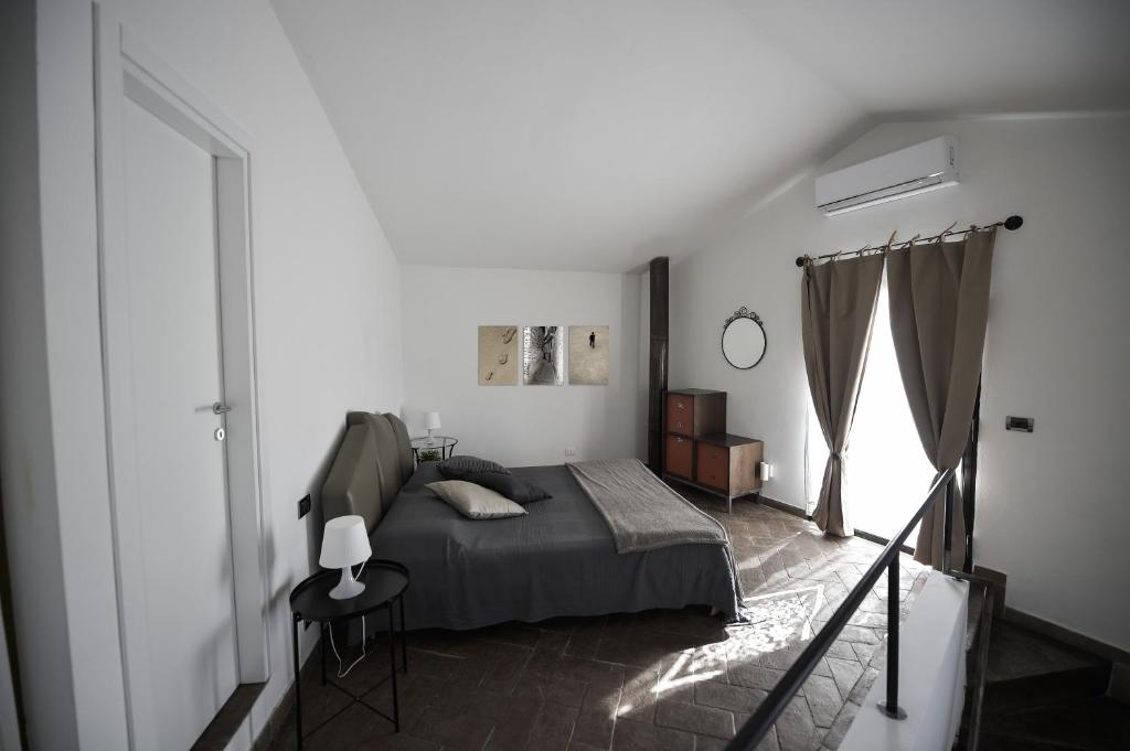 A bed or beds in a room at CASAILCAMBIO