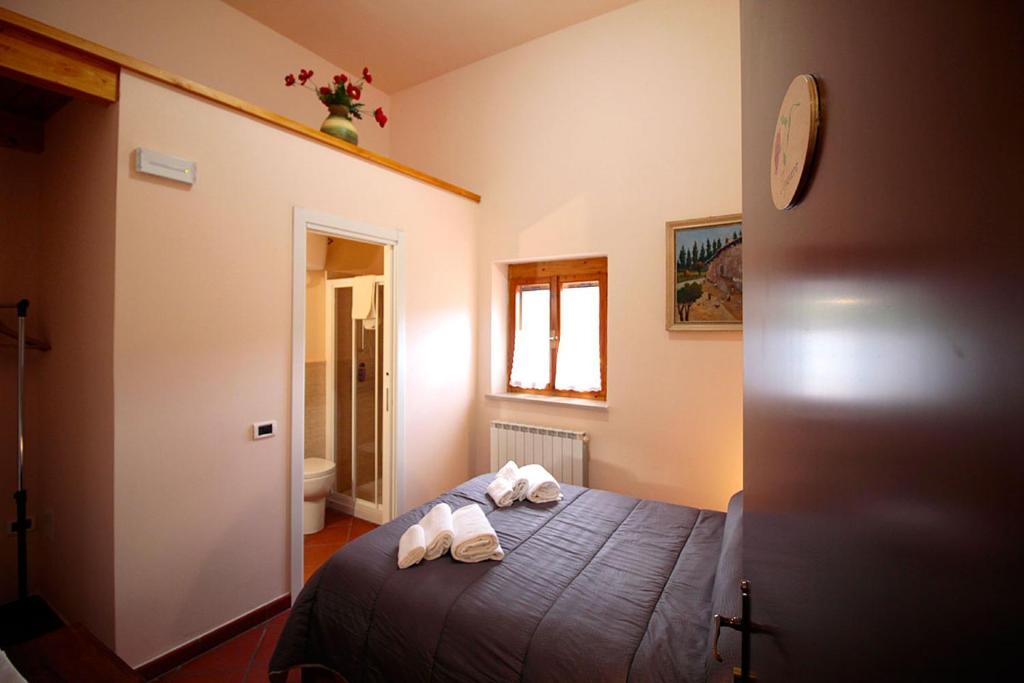 Posteľ alebo postele v izbe v ubytovaní Casale la Torretta