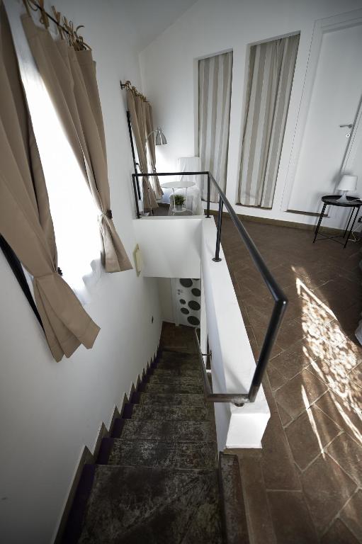 A bed or beds in a room at CASAILCAMBIO