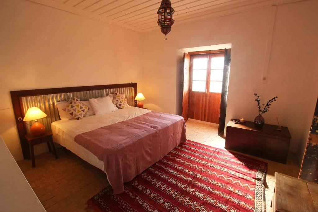 Postel nebo postele na pokoji v ubytování Casa Colonial Koenig
