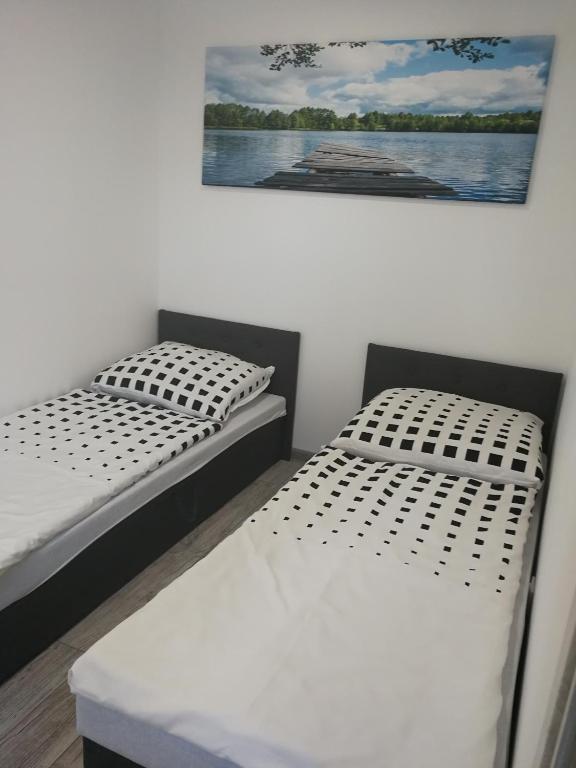 Postel nebo postele na pokoji v ubytování Motel OLIV