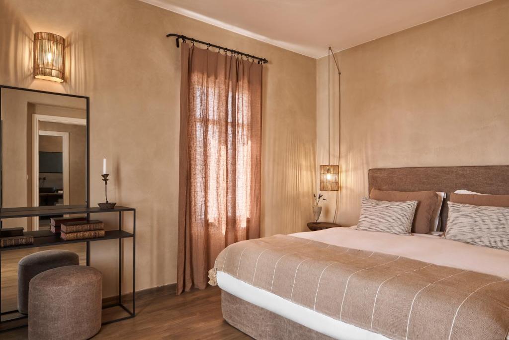 Posteľ alebo postele v izbe v ubytovaní Naxian Collection - Small Luxury Hotel of the World