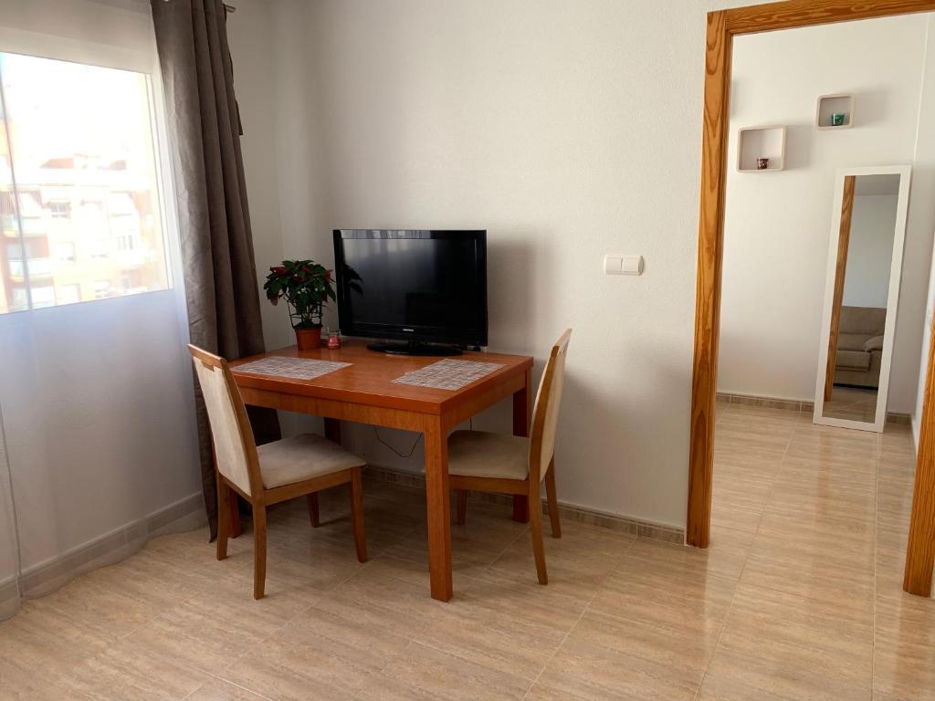 TV a/nebo společenská místnost v ubytování Apartment