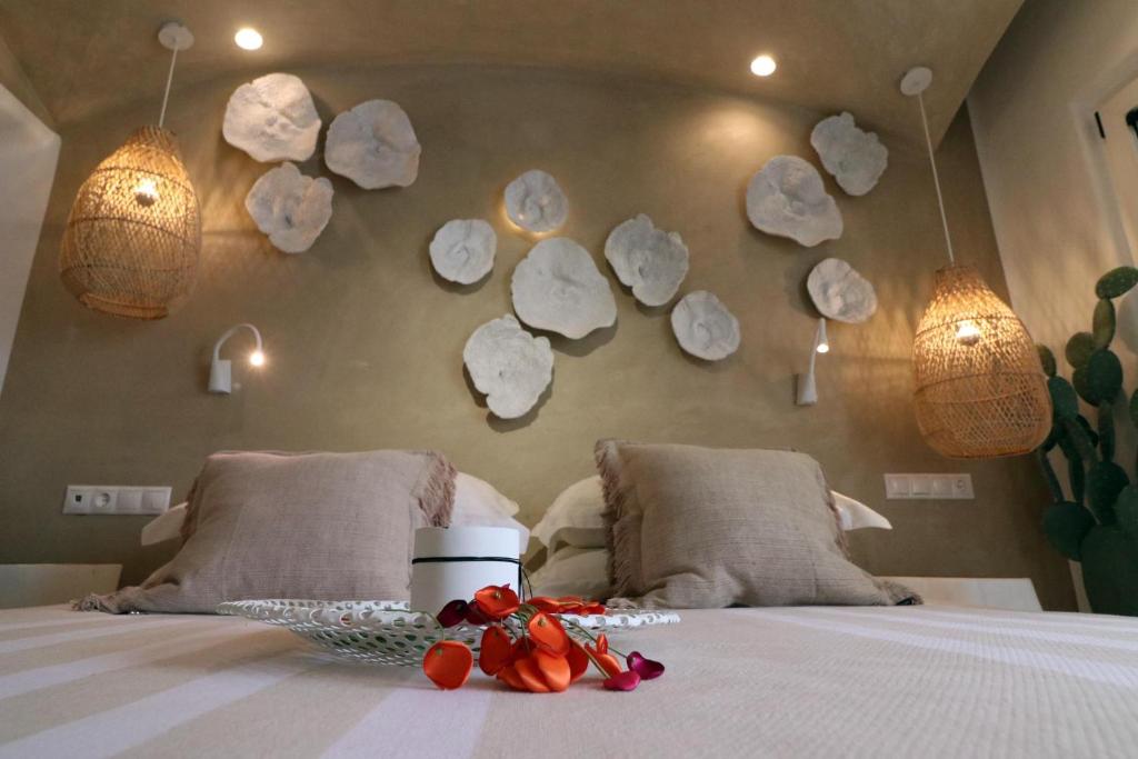 A bed or beds in a room at Narcissus Luxury Suites