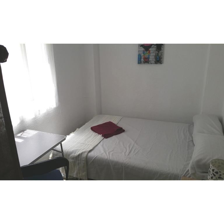 Postel nebo postele na pokoji v ubytování Smart Apartment near Malvarossa beach