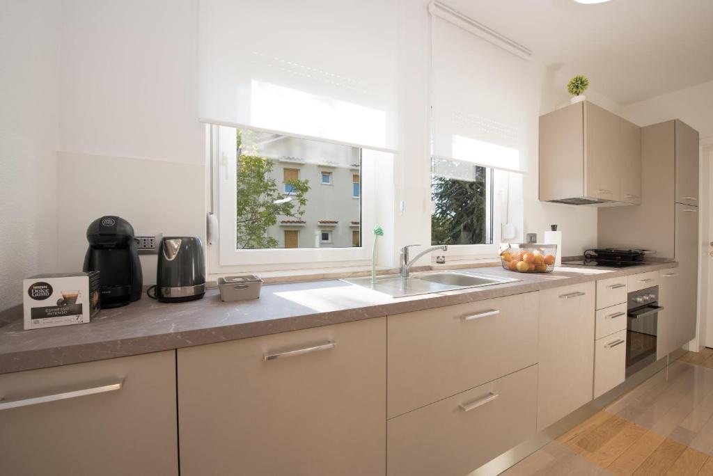 Kuchyňa alebo kuchynka v ubytovaní Apartmani BILIC