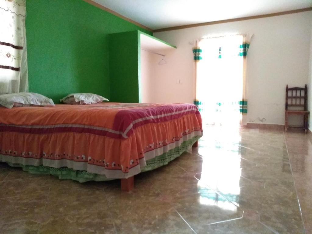 Postel nebo postele na pokoji v ubytování Casa GoEs