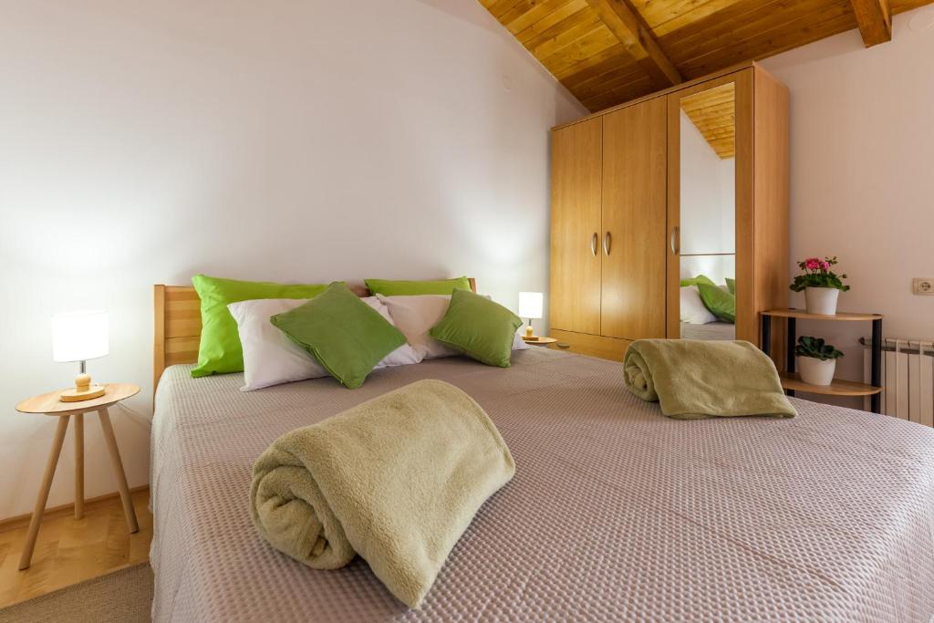 Un pat sau paturi într-o cameră la Soba Agata