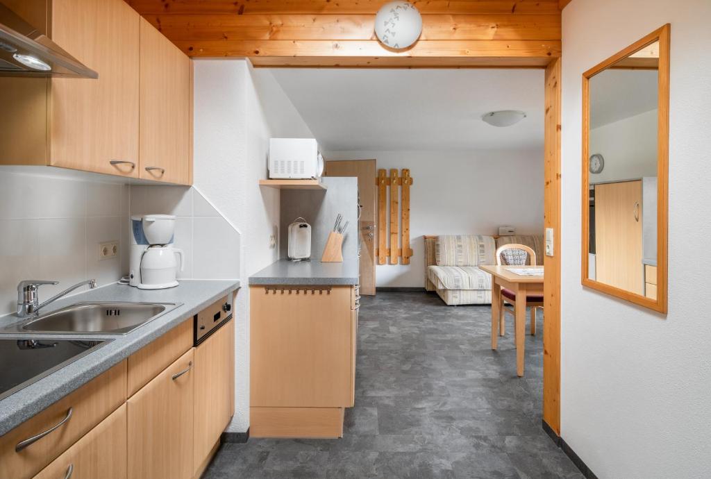 Kuchyň nebo kuchyňský kout v ubytování Haus Dabaklamm