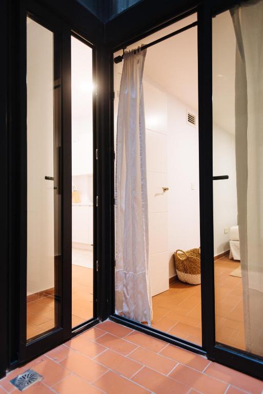 Posteľ alebo postele v izbe v ubytovaní Casa Galera Historic Downtown Apartment in Seville