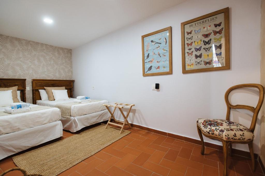 Posteľ alebo postele v izbe v ubytovaní Casa Galera Historic Downtown Apartment in Seville
