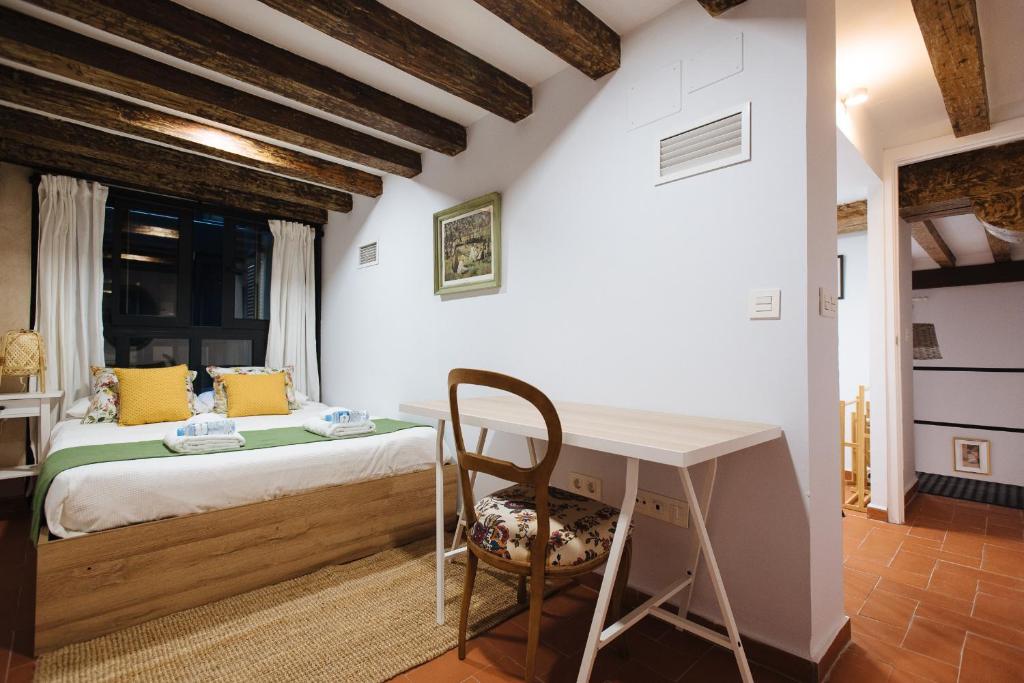 Posteľ alebo postele v izbe v ubytovaní Casa Galera Historic Downtown Apartment in Seville