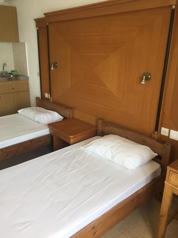 Postel nebo postele na pokoji v ubytování Diamond Beach Apts & Studios