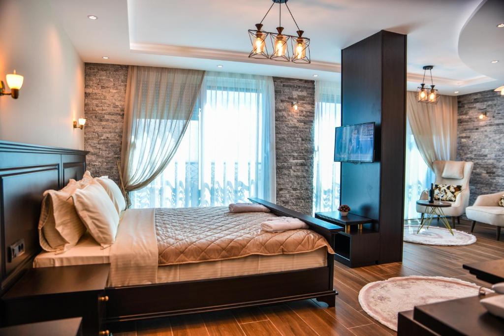 Postel nebo postele na pokoji v ubytování Padam Hotel & SPA