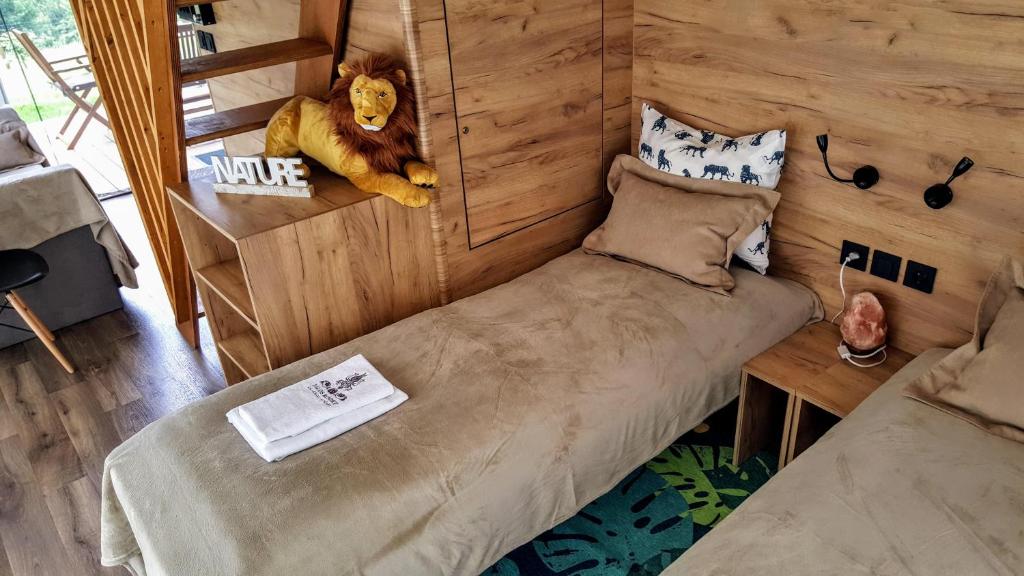 Postel nebo postele na pokoji v ubytování Pálos Resort