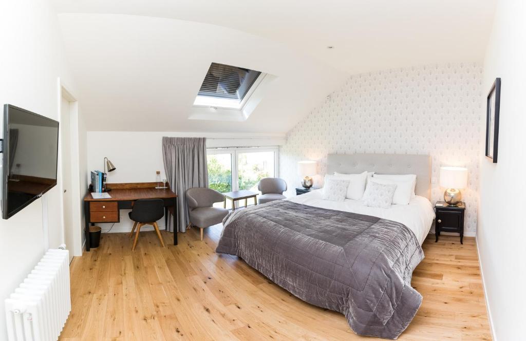 Postel nebo postele na pokoji v ubytování Chez Spoons B&B