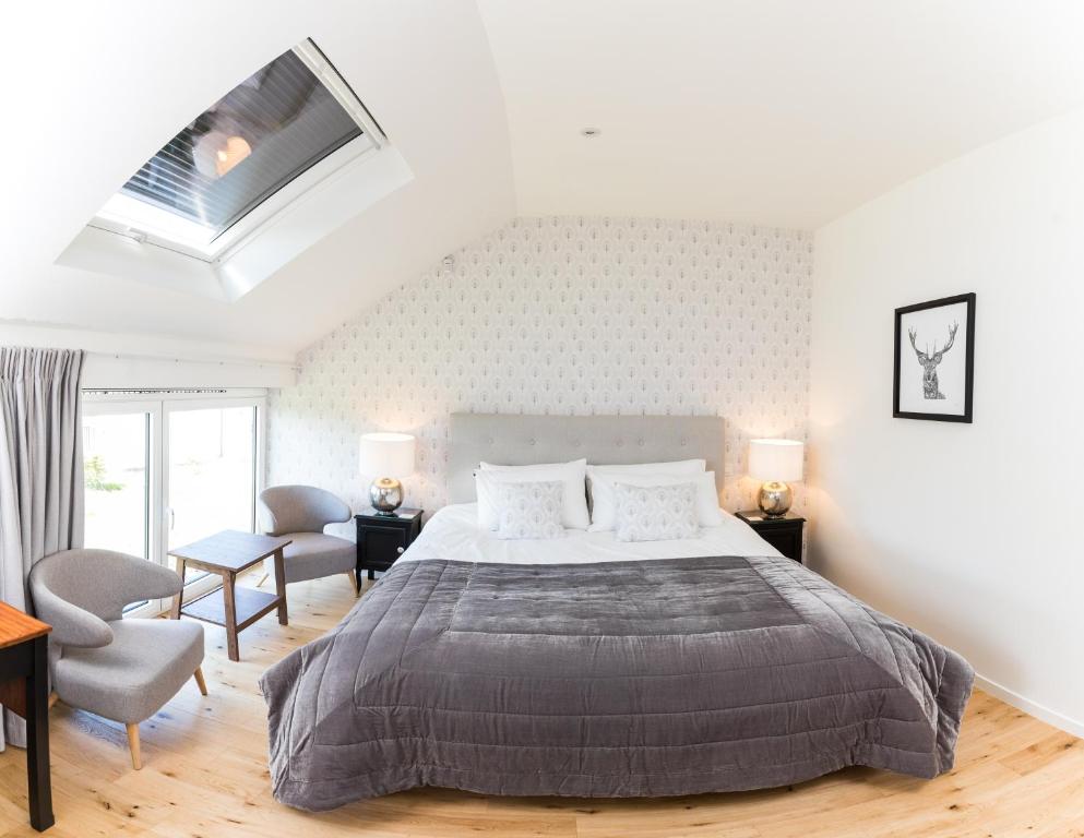Postel nebo postele na pokoji v ubytování Chez Spoons B&B