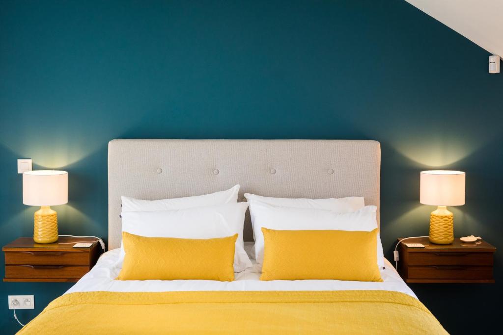 Postel nebo postele na pokoji v ubytování Chez Spoons B&B