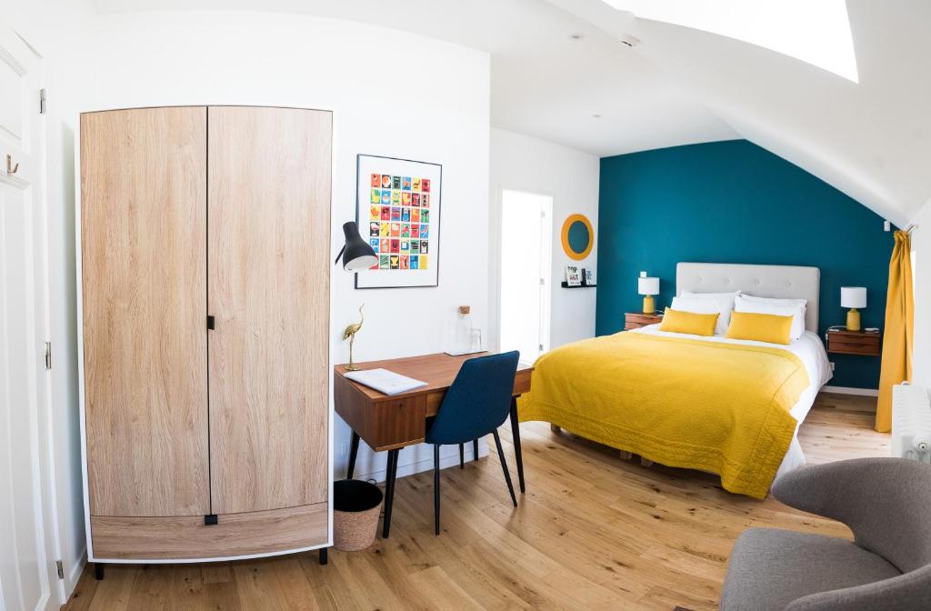 Postel nebo postele na pokoji v ubytování Chez Spoons B&B