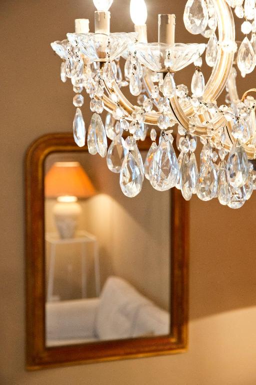Łóżko lub łóżka w pokoju w obiekcie BluLassù City Center Rooms